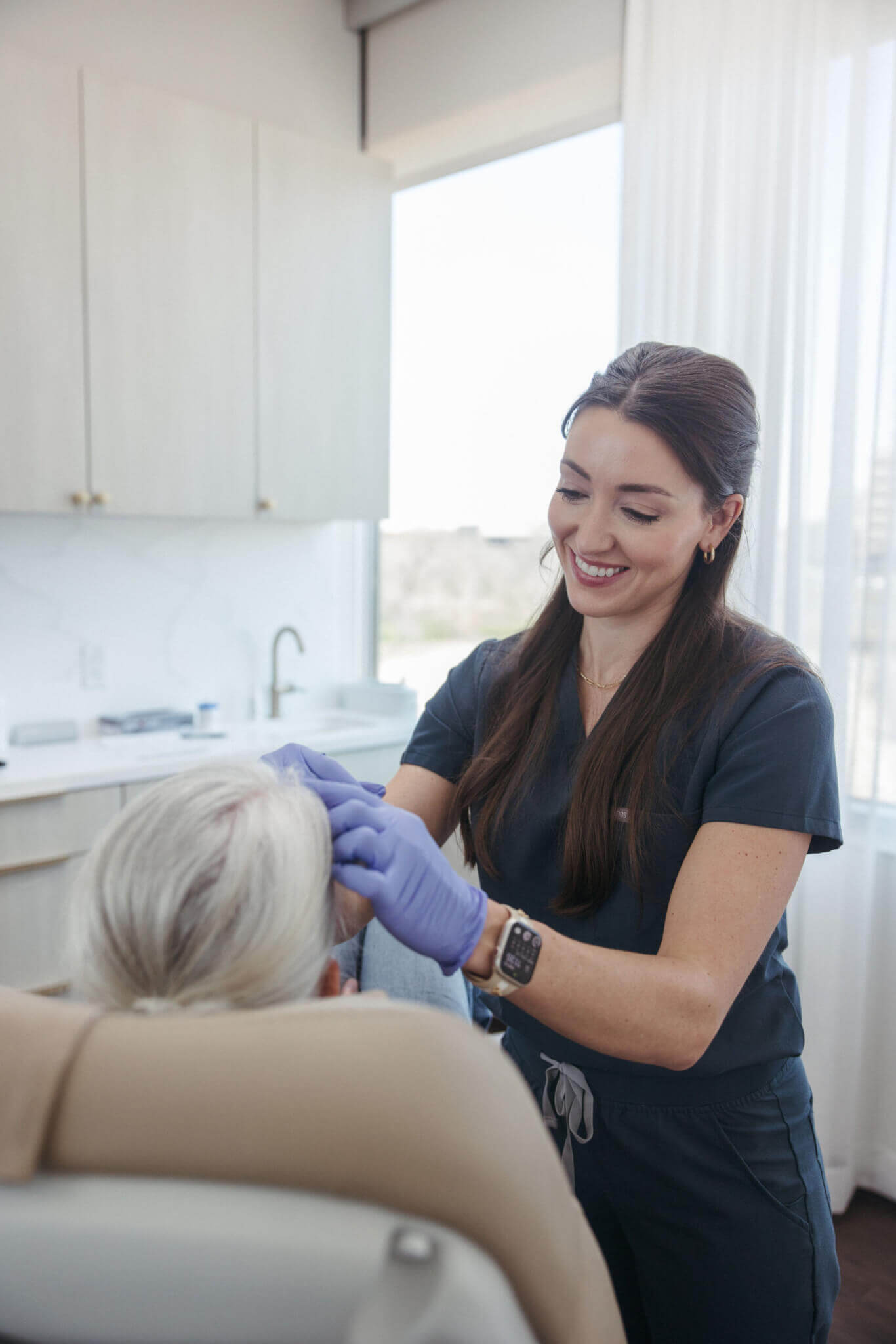 Lexie with Patient in Skin Lounge Nonsurgical aesthetics treatment in skincare clinic